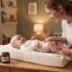 Parent applying natural diaper rash cream to a calm baby at home